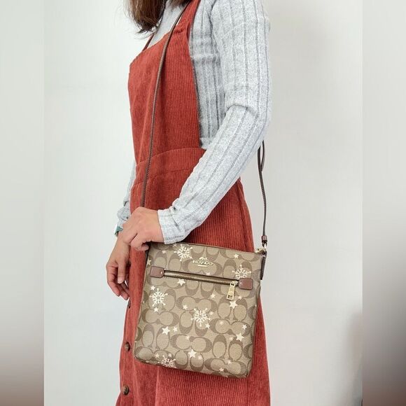 NWT Coach Mini Rowan File Bag In Signature Canvas With Star And Snowflake Print - Picture 1 of 7